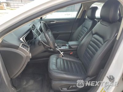 Zdjęcie 7 z 13 samochodu: 2017 FORD FUSION SE HYBRID VIN:3FA6P0LU9HR409653 - miniatura
