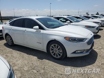 Czwarte zdjęcie samochodu z boku: 2017 FORD FUSION SE HYBRID VIN:3FA6P0LU7HR409702 - miniatura