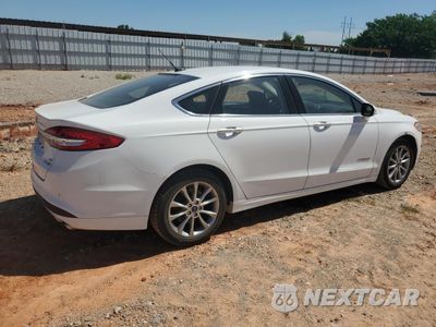 Trzecie zdjęcie samochodu z tyłu: 2017 FORD FUSION SE HYBRID VIN:3FA6P0LU5HR409097 - miniatura