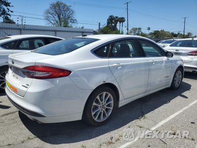 Trzecie zdjęcie samochodu z tyłu: 2017 FORD FUSION SE HYBRID VIN:3FA6P0LUXHR409371 - miniatura
