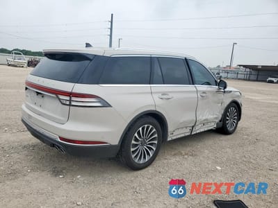 Trzecie zdjęcie samochodu z tyłu: 2022 LINCOLN AVIATOR RESERVE VIN:5LM5J7WC9NGL01600 - miniatura