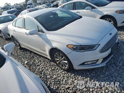 Czwarte zdjęcie samochodu z boku: 2017 FORD FUSION SE HYBRID VIN:3FA6P0LU8HR409644 - miniatura