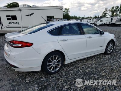Trzecie zdjęcie samochodu z tyłu: 2017 FORD FUSION SE HYBRID VIN:3FA6P0LU2HR359596 - miniatura