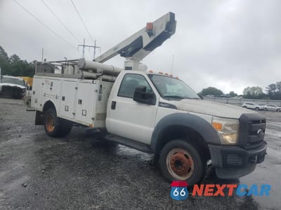 Czwarte zdjęcie samochodu z boku: 2015 FORD F450 SUPER DUTY VIN:1FDUF4GY7FEA16948 - miniatura