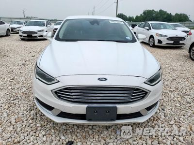 Piąte zdjęcie samochodu w środku: 2018 FORD FUSION SE HYBRID VIN:3FA6P0LU1JR171612 - miniatura