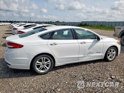 Trzecie zdjęcie samochodu z tyłu: 2018 FORD FUSION SE HYBRID VIN:3FA6P0LU3JR171689 - miniatura