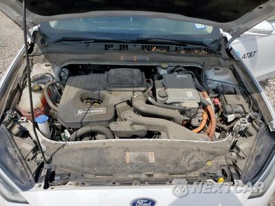 Zdjęcie 11 z 13 samochodu: 2018 FORD FUSION SE HYBRID VIN:3FA6P0LU6JR171637 - miniatura