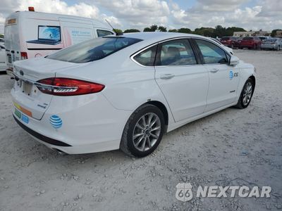 Trzecie zdjęcie samochodu z tyłu: 2017 FORD FUSION SE HYBRID VIN:3FA6P0LU6HR359536 - miniatura