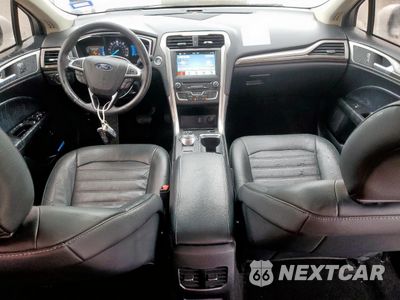 Zdjęcie 8 z 12 samochodu: 2018 FORD FUSION SE HYBRID VIN:3FA6P0LU1JR171643 - miniatura