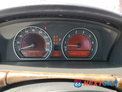 Zdjęcie 9 z 12 samochodu: 2007 BMW 750 I VIN:WBAHL83567DT08922 - miniatura