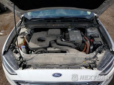 Zdjęcie 11 z 13 samochodu: 2018 FORD FUSION SE HYBRID VIN:3FA6P0LU3JR118717 - miniatura