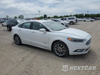 Czwarte zdjęcie samochodu z boku: 2017 FORD FUSION SE HYBRID VIN:3FA6P0LU5HR409598 - miniatura