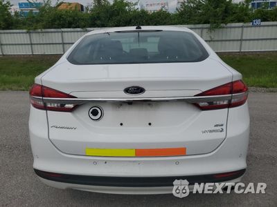 Zdjęcie 6 z 13 samochodu: 2017 FORD FUSION SE HYBRID VIN:3FA6P0LUXHR409452 - miniatura
