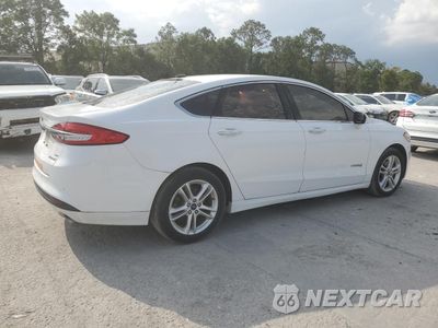Trzecie zdjęcie samochodu z tyłu: 2018 FORD FUSION SE HYBRID VIN:3FA6P0LU9JR171731 - miniatura