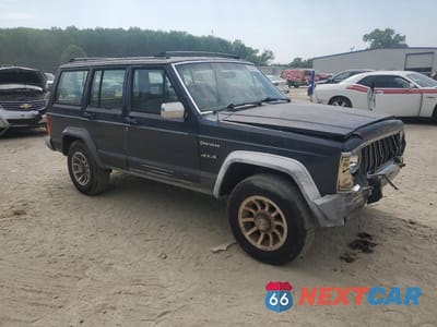 Czwarte zdjęcie samochodu z boku: 1990 JEEP CHEROKEE LAREDO VIN:1J4FJ58L0LL220173 - miniatura
