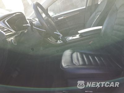 Zdjęcie 7 z 13 samochodu: 2017 FORD FUSION SE HYBRID VIN:3FA6P0LU0HR409282 - miniatura