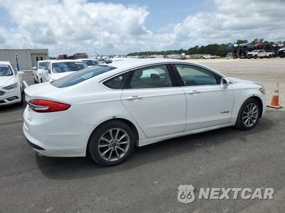 Trzecie zdjęcie samochodu z tyłu: 2017 FORD FUSION SE HYBRID VIN:3FA6P0LU2HR409560 - miniatura