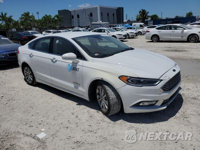 Czwarte zdjęcie samochodu z boku: 2017 FORD FUSION SE HYBRID VIN:3FA6P0LU7HR410140 - miniatura