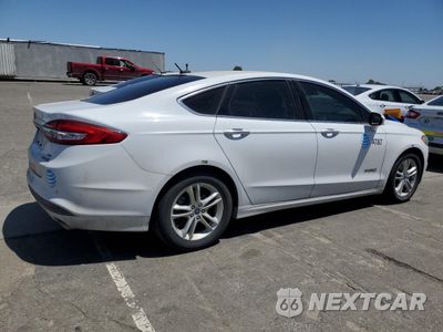 Trzecie zdjęcie samochodu z tyłu: 2018 FORD FUSION SE HYBRID VIN:3FA6P0LU8JR171543 - miniatura