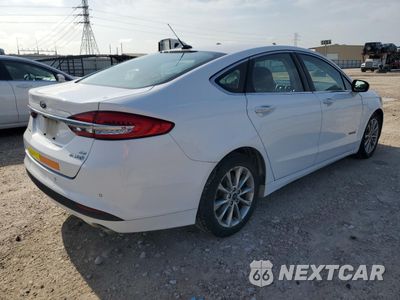 Trzecie zdjęcie samochodu z tyłu: 2017 FORD FUSION SE HYBRID VIN:3FA6P0LUXHR410150 - miniatura