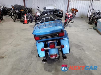 Czwarte zdjęcie samochodu z boku: 2011 HARLEY-DAVIDSON FLHTK VIN:1HD1KEM17BB641490 - miniatura