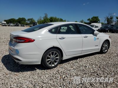 Trzecie zdjęcie samochodu z tyłu: 2017 FORD FUSION SE HYBRID VIN:3FA6P0LU4HR409074 - miniatura