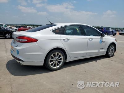 Trzecie zdjęcie samochodu z tyłu: 2017 FORD FUSION SE HYBRID VIN:3FA6P0LU0HR408987 - miniatura