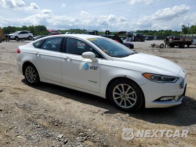 Czwarte zdjęcie samochodu z boku: 2017 FORD FUSION SE HYBRID VIN:3FA6P0LUXHR409516 - miniatura
