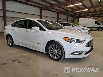 Czwarte zdjęcie samochodu z boku: 2017 FORD FUSION SE HYBRID VIN:3FA6P0LU9HR409524 - miniatura