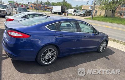 Czwarte zdjęcie samochodu z boku: 2015 FORD FUSION SE VIN:3FA6P0HD6FR291079 - miniatura