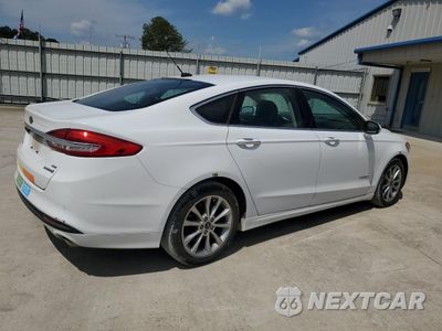 Trzecie zdjęcie samochodu z tyłu: 2017 FORD FUSION SE HYBRID VIN:3FA6P0LU7HR409537 - miniatura