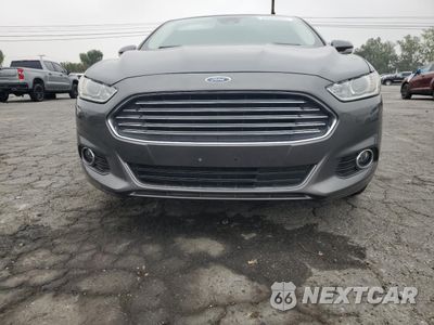 Piąte zdjęcie samochodu w środku: 2016 FORD FUSION TITANIUM VIN:3FA6P0K97GR281554 - miniatura