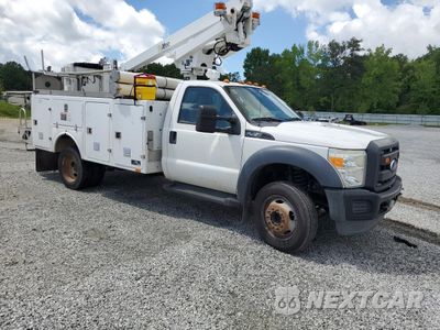 Czwarte zdjęcie samochodu z boku: 2015 FORD F450 SUPER DUTY VIN:1FDUF4GYXFEA17219 - miniatura