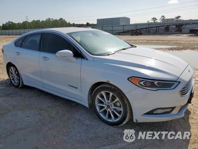 Czwarte zdjęcie samochodu z boku: 2017 FORD FUSION SE HYBRID VIN:3FA6P0LU9HR409393 - miniatura