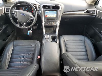 Zdjęcie 8 z 12 samochodu: 2017 FORD FUSION SE HYBRID VIN:3FA6P0LU1HR359590 - miniatura