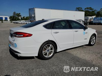 Trzecie zdjęcie samochodu z tyłu: 2018 FORD FUSION SE HYBRID VIN:3FA6P0LU9JR163497 - miniatura