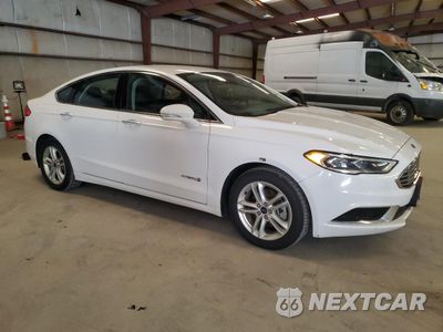 Czwarte zdjęcie samochodu z boku: 2018 FORD FUSION SE HYBRID VIN:3FA6P0LU2JR278684 - miniatura