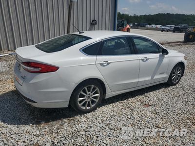 Trzecie zdjęcie samochodu z tyłu: 2017 FORD FUSION SE HYBRID VIN:3FA6P0LUXHR410083 - miniatura