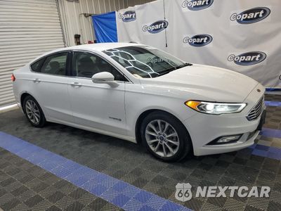 Czwarte zdjęcie samochodu z boku: 2017 FORD FUSION SE HYBRID VIN:3FA6P0LU8HR409501 - miniatura