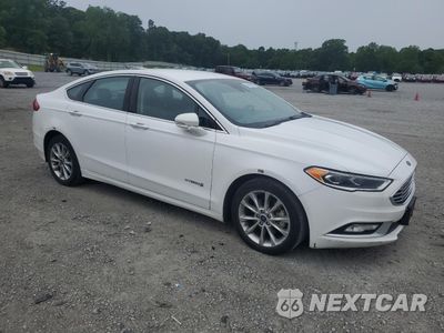 Czwarte zdjęcie samochodu z boku: 2017 FORD FUSION SE HYBRID VIN:3FA6P0LU9HR410088 - miniatura