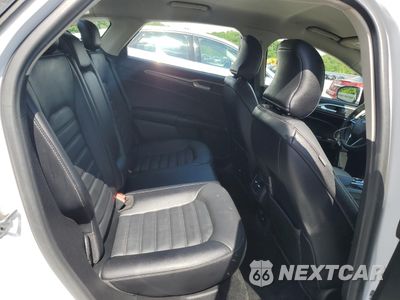 Zdjęcie 10 z 12 samochodu: 2017 FORD FUSION SE HYBRID VIN:3FA6P0LU1HR359542 - miniatura