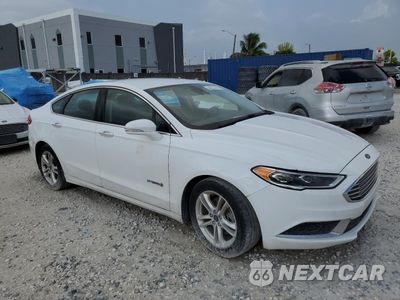 Czwarte zdjęcie samochodu z boku: 2018 FORD FUSION SE HYBRID VIN:3FA6P0LU2JR171909 - miniatura