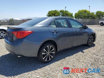 Trzecie zdjęcie samochodu z tyłu: 2017 TOYOTA COROLLA SE VIN:5YFBURHE7HP685651 - miniatura