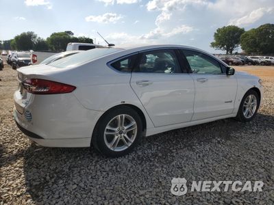 Trzecie zdjęcie samochodu z tyłu: 2018 FORD FUSION SE HYBRID VIN:3FA6P0LU0JR163484 - miniatura