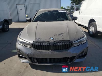 Piąte zdjęcie samochodu w środku: 2020 BMW 330I VIN:3MW5R1J01L8B18419 - miniatura