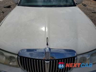 Zdjęcie 11 z 12 samochodu: 2002 LINCOLN TOWN CAR EXECUTIVE VIN:1LNHM81W02Y613809 - miniatura