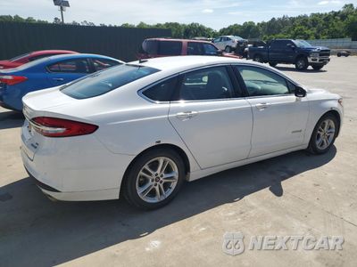 Trzecie zdjęcie samochodu z tyłu: 2018 FORD FUSION SE HYBRID VIN:3FA6P0LUXJR171768 - miniatura