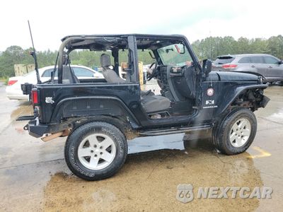 Trzecie zdjęcie samochodu z tyłu: 2009 JEEP WRANGLER X VIN:1J4FA24119L729068 - miniatura