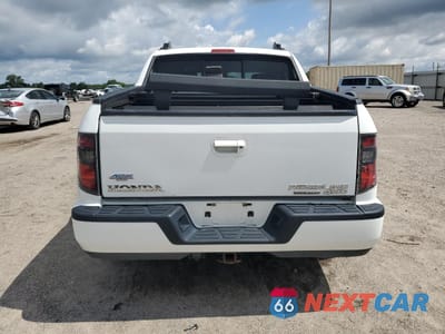 Zdjęcie 6 z 12 samochodu: 2014 HONDA RIDGELINE RTL-S VIN:5FPYK1F65EB006617 - miniatura