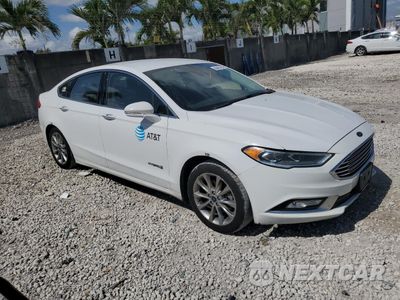 Czwarte zdjęcie samochodu z boku: 2017 FORD FUSION SE HYBRID VIN:3FA6P0LU8HR359621 - miniatura